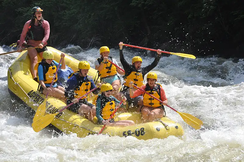Students whitewater rafting with Adventure Bound.
