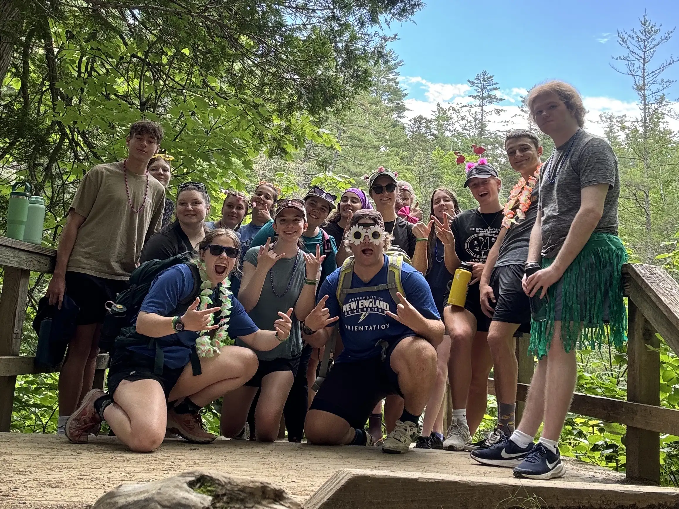 Group of college students hiking at Moxie Falls.