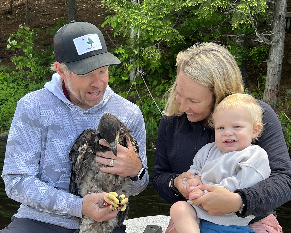 Maine family with juvenile eagle.